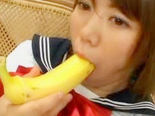 ty Asian schoolgirl drills her snatch with a banana
