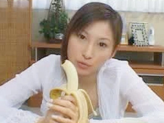 Horny babe gets a nice Asian facial from her boyfriend