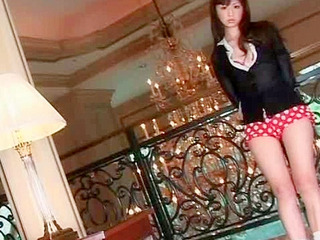 Japanese babe with piggy tail gets horny indoors for some XXX action